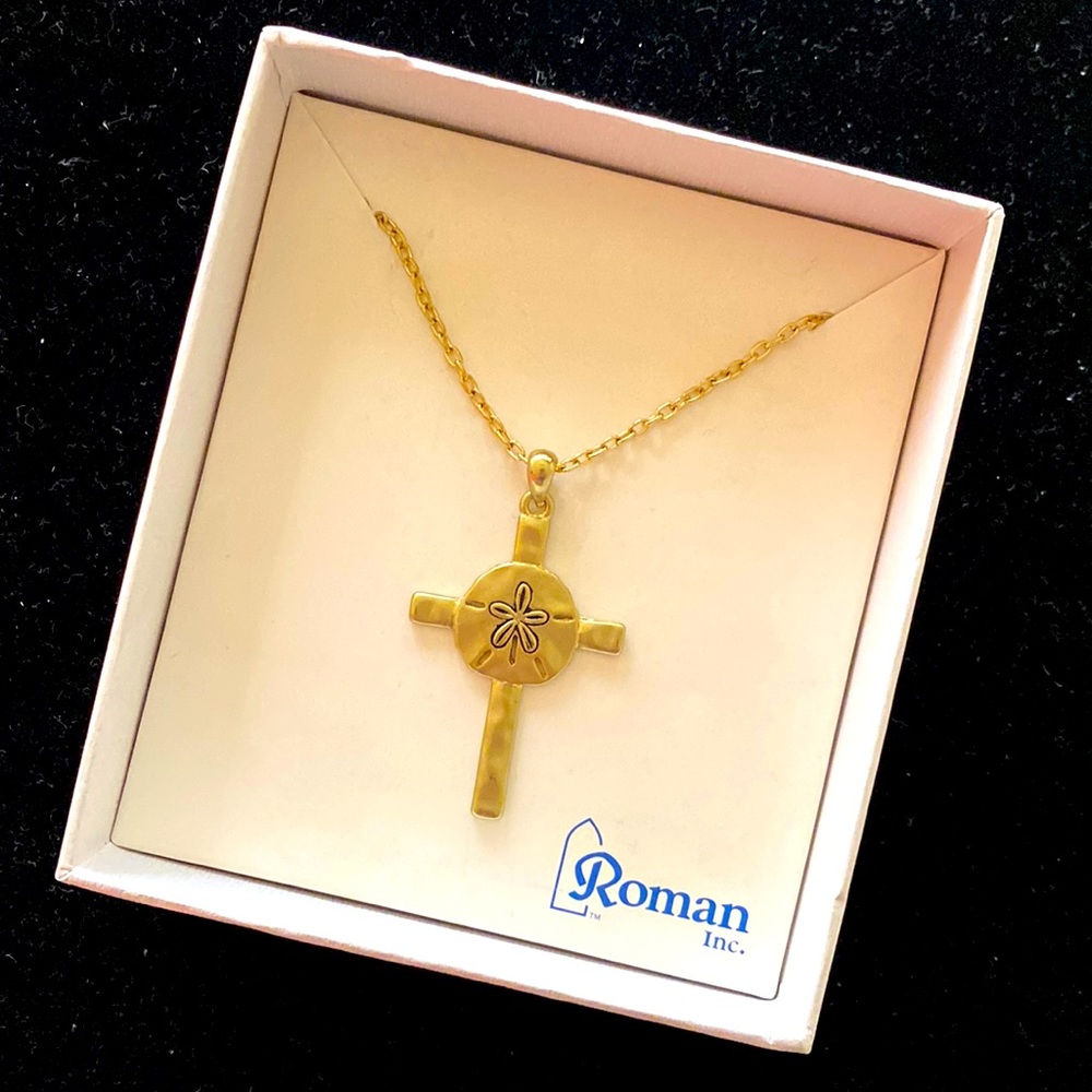 New Roman Inc cross/ sand dollar in a box.